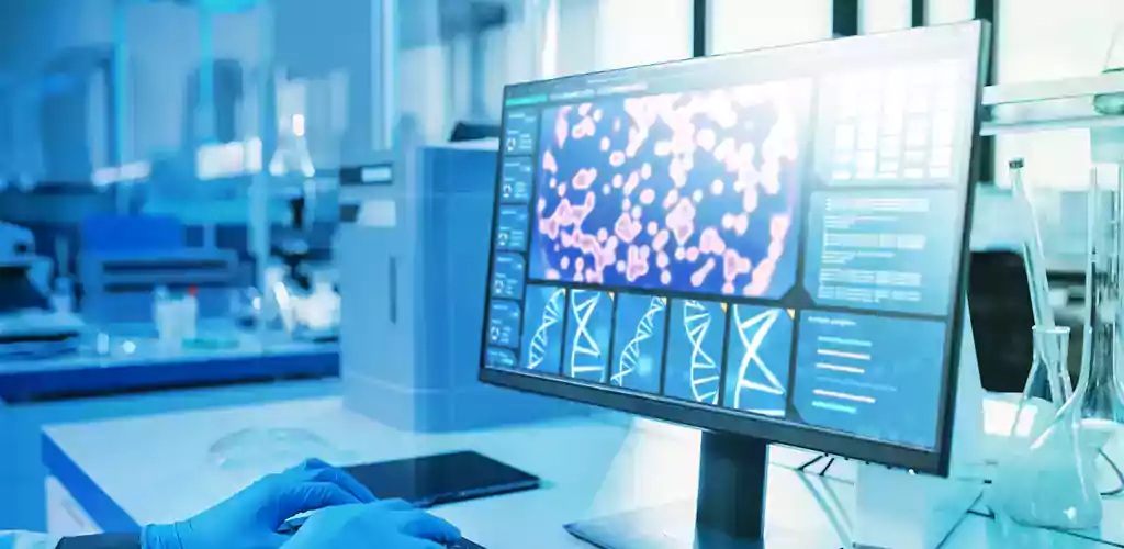A computer screen showing images of molecules and DNA.