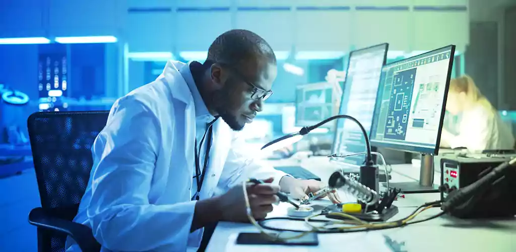 A specialist biologist analyzing a test sample.