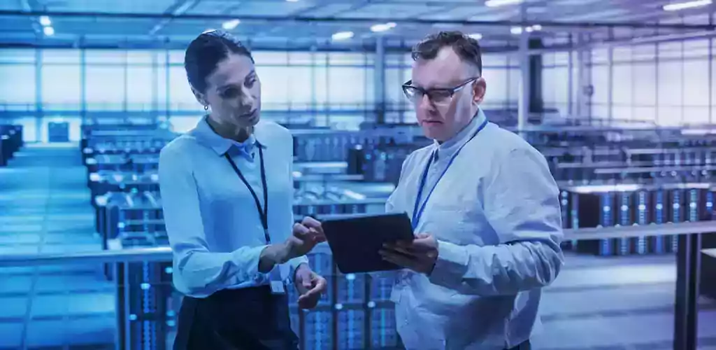 Two scientific agents in a industrial plant.